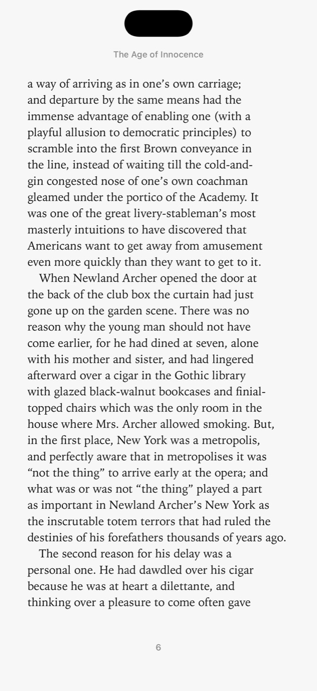 The reader showing a page of The Age of Innocence
